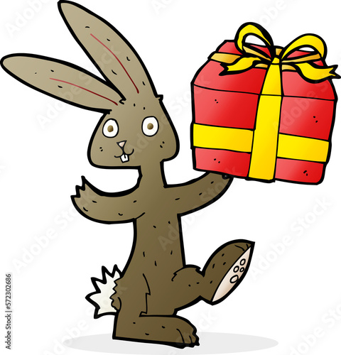 cartoon rabbit with christmas present © lineartestpilot