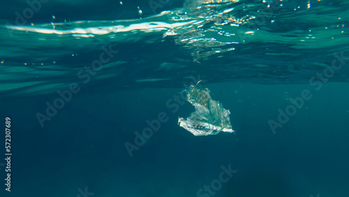 close-up of a plastic bag floating in the sea. Garbage in the sea water. Environmental Pollution of plastic rubbish pollution in oceans and seas. Environment, Pollution concept © djtrenerfotolia