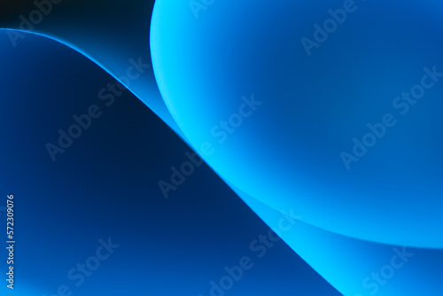 Blue abstract gradient wavy  curved layers background.