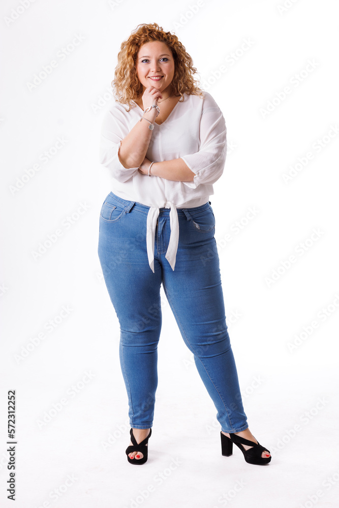 Plus size fashion model, fat woman in denim clothes and white shirt on white background, overweight female body Plus size fashion model, fat woman in denim clothes and white shirt on white background, overweight female body