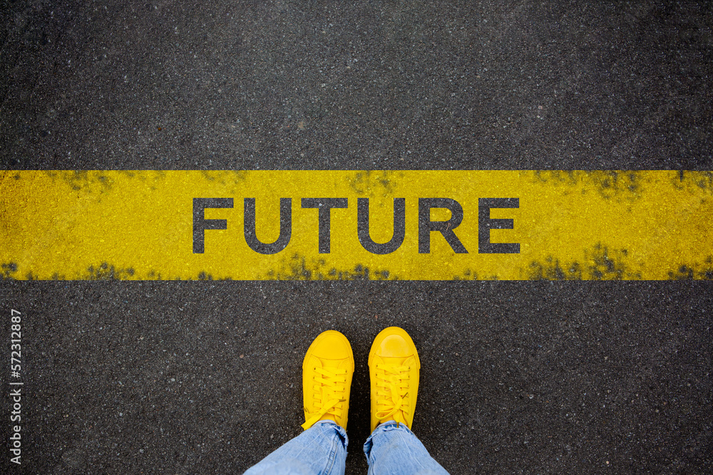 Yellow sneakers on the asphalt road. Step into the future - obrazy, fototapety, plakaty 