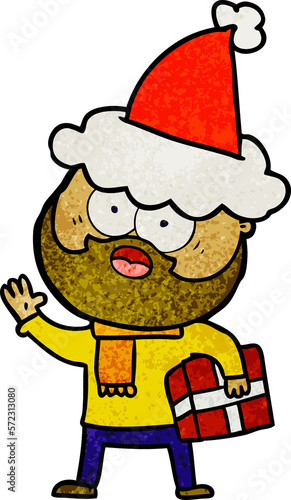 textured cartoon of a bearded man with present wearing santa hat