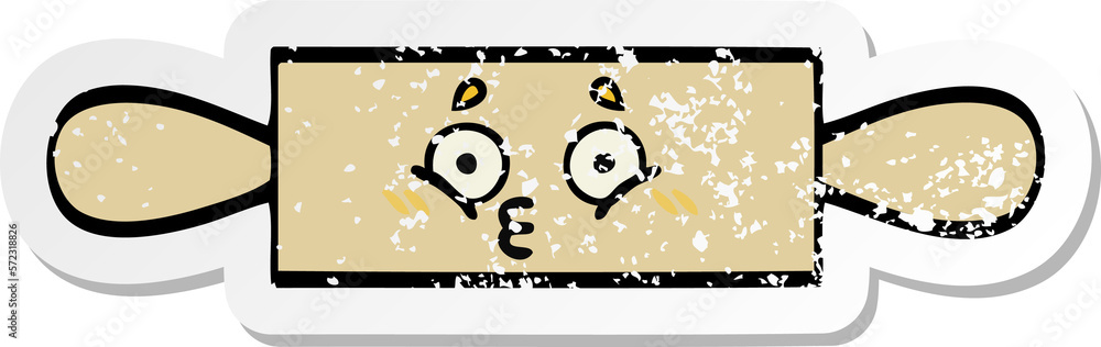 Fototapeta premium distressed sticker of a cute cartoon rolling pin