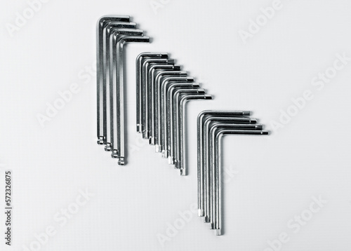 Hex keys kit on white background top view.