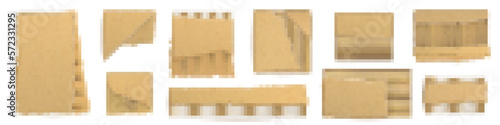 Set of torn brown cardboard pieces isolated on white background. Realictic vector illustration of ripped craft paper or carton with uneven edges and damaged texture. Scrap material for recycling