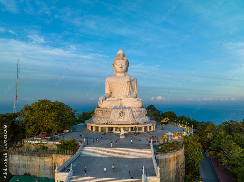 Fototapeta premium aerial photography scenery blue sky and blue ocean behind Phuket white big Buddha. Phuket white big Buddha is the .famous landmark in Phuket..Aerial panoramic view landscape Phuket big Buddha.