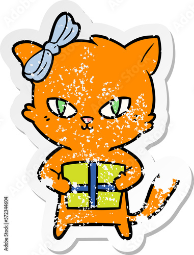 distressed sticker of a cute cartoon cat with present