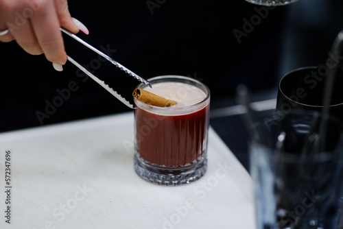 barman prepares a spicy hot coffee drink