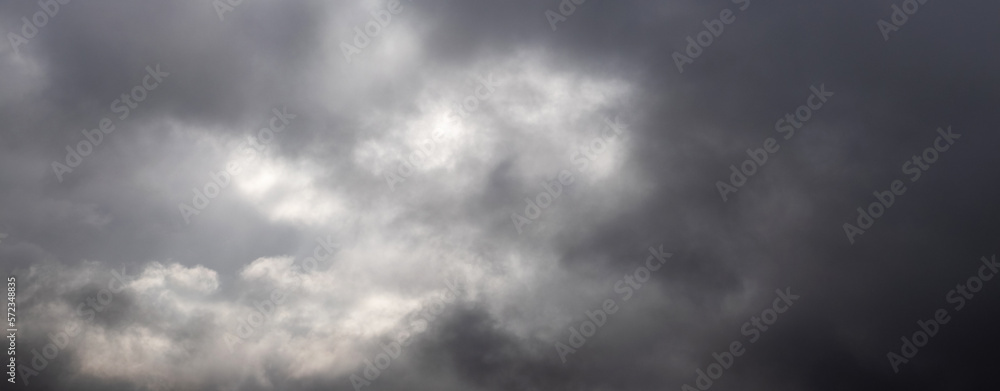 The sky is covered with dark storm clouds The sky is covered with dark storm clouds