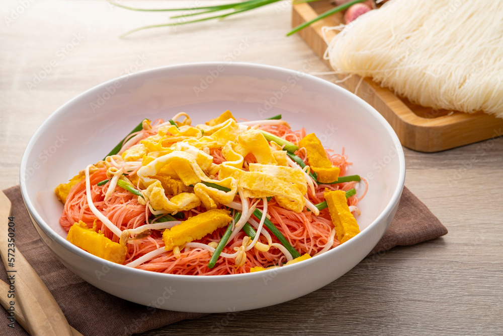 Stir fry rice vermicelli with Yen Ta Fo sauce.Pink sweet and sour thin