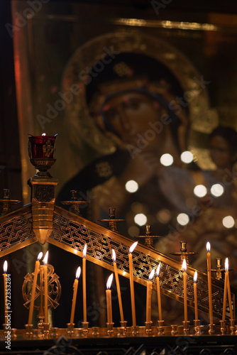 Konstfotografi Palm Sunday, candles are lit in the Orthodox church in front of the icon