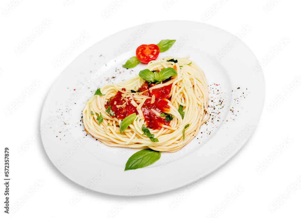 Spaghetti pasta with tomatoes and basil on plate Spaghetti pasta with tomatoes and basil on plate