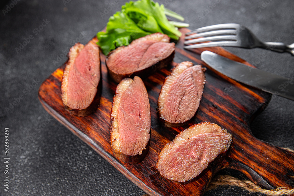 duck breast roasted second course fresh poultry meat meal food snack on the table copy space food background rustic top view duck breast roasted second course fresh poultry meat meal food snack on the table copy space food background rustic top view