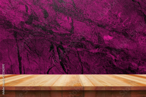 Wood table top on bare concrete wall background - can be used for display or montage your products