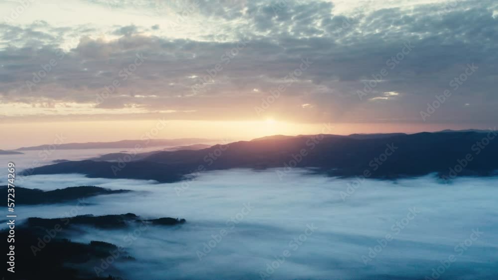 Mountain aerial, epic view. Aerial view of mountain landscape with morning fog, Tatra high mountains in the sunny morning after sunrise. Drone footage of misty forest and magical alpine scenery Mountain aerial, epic view. Aerial view of mountain landscape with morning fog, Tatra high mountains in the sunny morning after sunrise. Drone footage of misty forest and magical alpine scenery