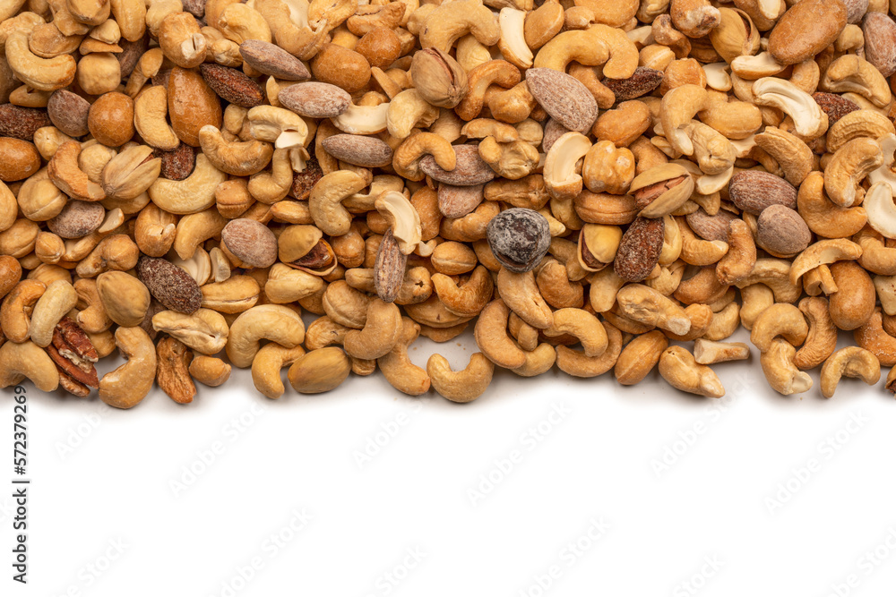A group of almonds, pistachios, walnuts, macadamia, cashews. A group of almonds, pistachios, walnuts, macadamia, cashews.