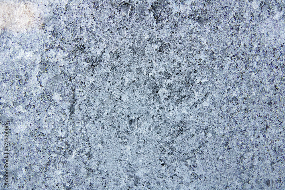 Blue frost pattern on glass, background or texture Blue frost pattern on glass, background or texture