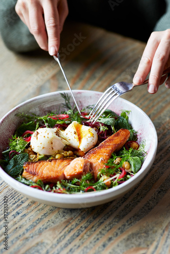 Wallpaper Mural Crop person eating delicious salad with salmon Torontodigital.ca