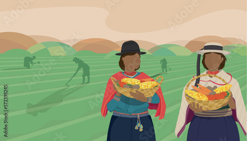 Two indigenous women from the area of the central highlands of Ecuador carrying baskets with corn, potatoes and carrots with a background of fields planted with silhouettes of women working with a hoe