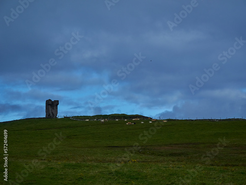 Old castle tower at the cliffs of Moher in Ireland