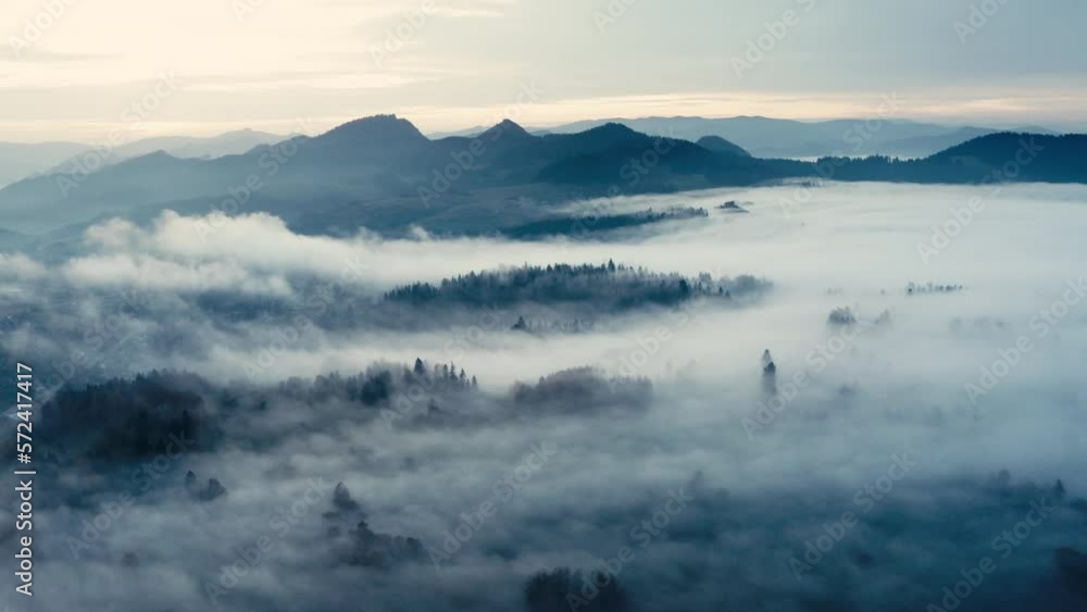 Mountain aerial, epic view. Aerial view of mountain landscape with morning fog, Tatra high mountains in the sunny morning after sunrise. Drone footage of misty forest and magical alpine scenery Mountain aerial, epic view. Aerial view of mountain landscape with morning fog, Tatra high mountains in the sunny morning after sunrise. Drone footage of misty forest and magical alpine scenery