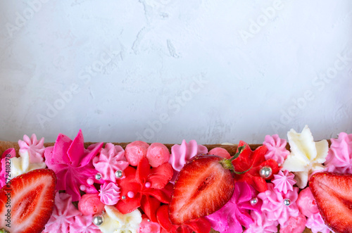 Summer cake frame with strawberries and cream. Delicious beautiful dessert border. Greeting card, party invitation, wedding