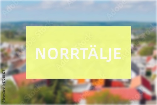 Norrtälje: Der Name der schwedischen Stadt Norrtälje in der Region Stockholm vor einem Hintergrundbild photo