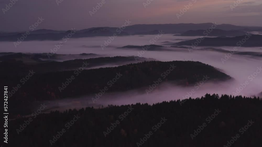 Mountain aerial, epic view. Aerial view of mountain landscape with morning fog, Tatra high mountains in the sunny morning after sunrise. Drone footage of misty forest and magical alpine scenery Mountain aerial, epic view. Aerial view of mountain landscape with morning fog, Tatra high mountains in the sunny morning after sunrise. Drone footage of misty forest and magical alpine scenery