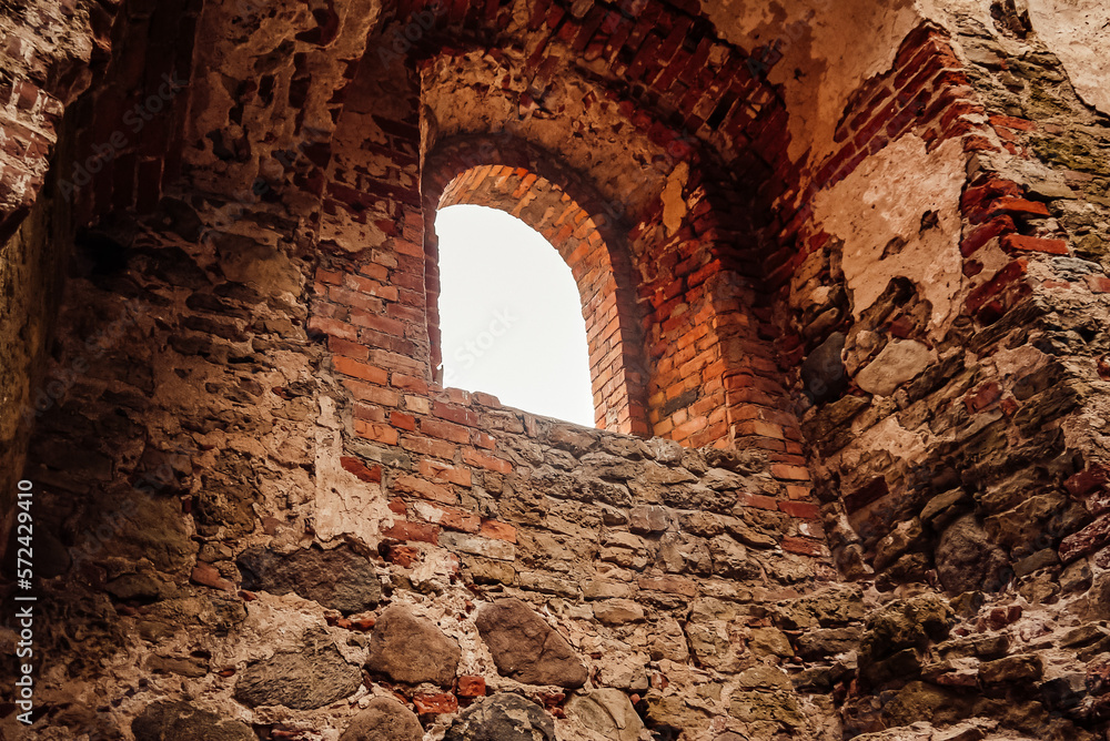Castle ruins of Latvian city, castle ruins window, red brick