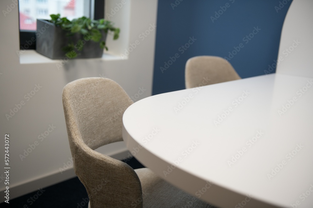 Modern meeting room interior with table and chairs Modern meeting room interior with table and chairs