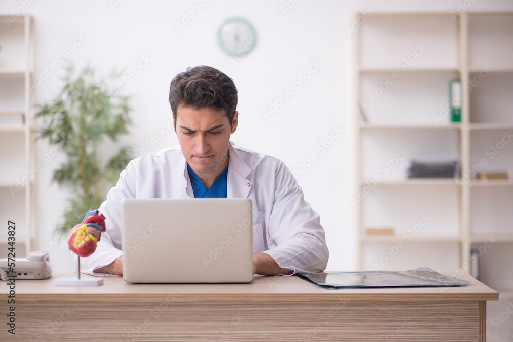 Young male doctor in telemedicine concept Young male doctor in telemedicine concept