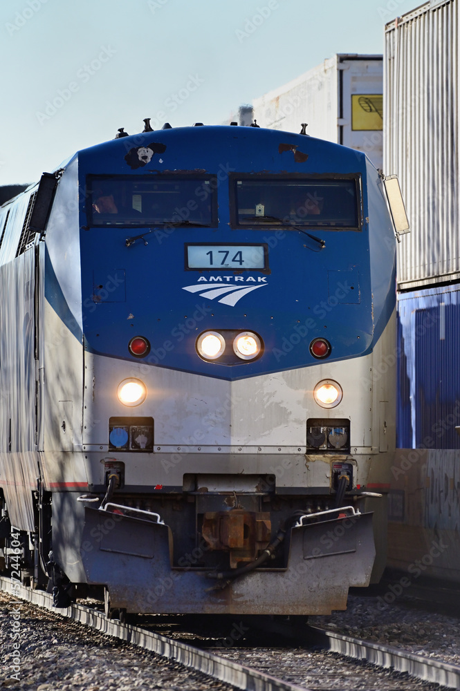 An Amtrak passenger train after making a stop at the local suburban