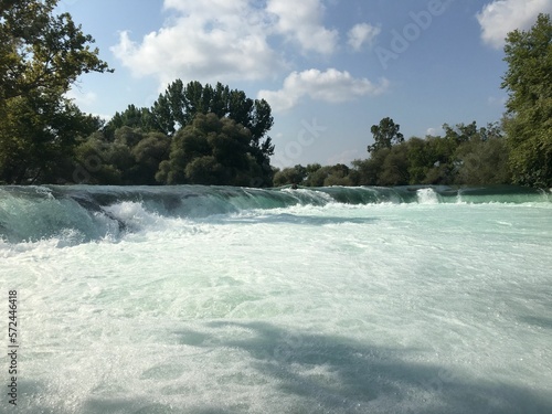 A photo from the manavgat waterfall, a touristic area in Turkey, a corner of paradise with trees