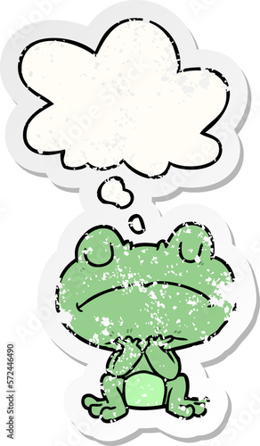 cartoon frog and thought bubble as a distressed worn sticker