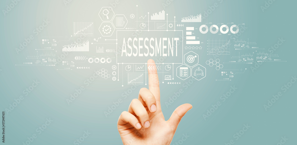 Assessment concept with hand pressing a button on a technology screen Assessment concept with hand pressing a button on a technology screen