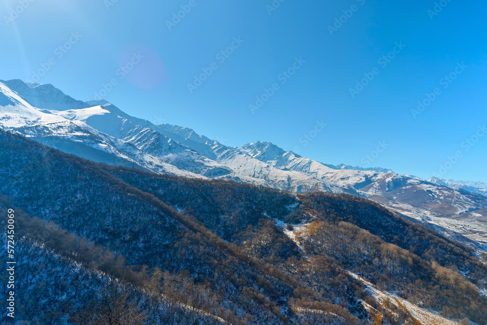 View of the snow-capped mountains on a sunny day