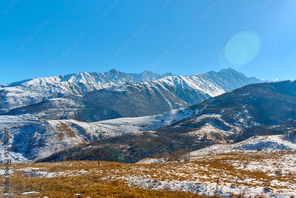 View of the snow-capped mountains on a sunny day