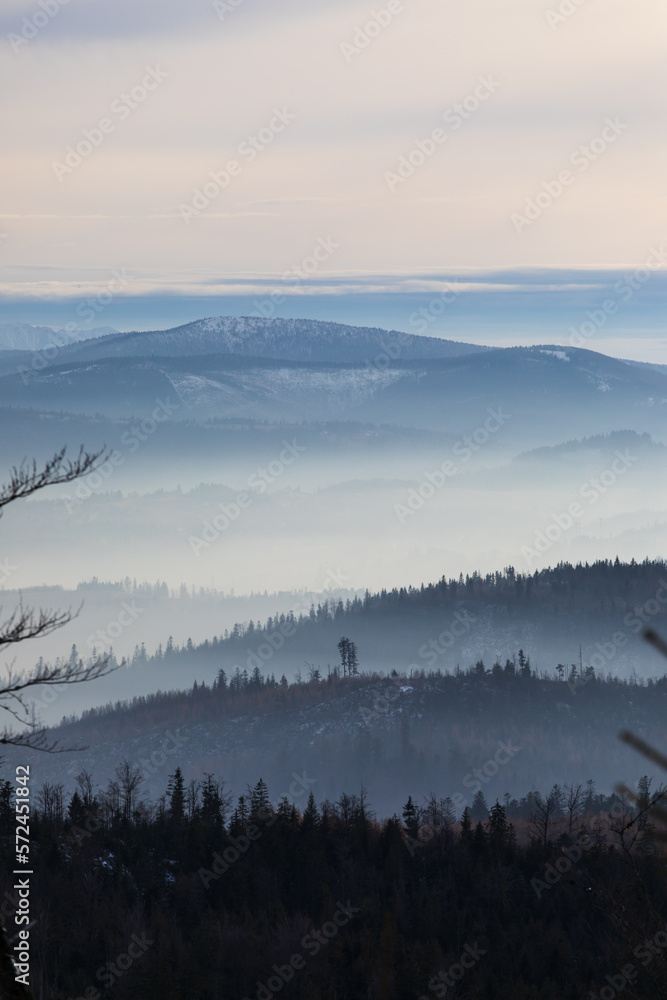 Foogy hills winter scenery in Poland Barania mount