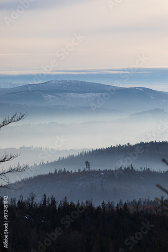Foogy hills winter scenery in Poland Barania mount