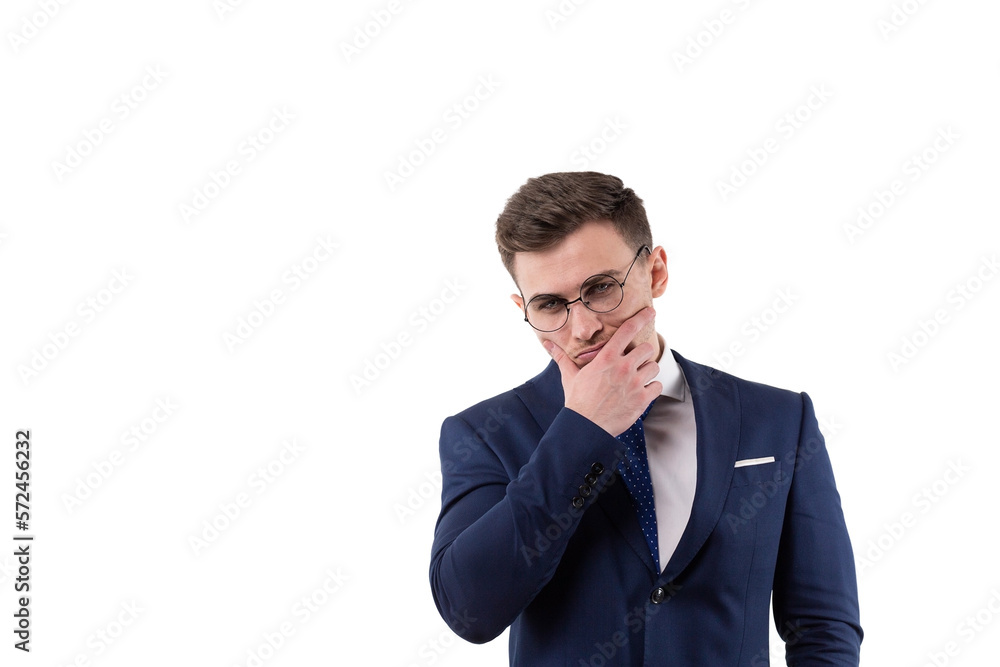 Handsome male businessman in a suit conceived about solving a problem. Holding on to the beard in studio on a white background. Handsome male businessman in a suit conceived about solving a problem. Holding on to the beard in studio on a white background.