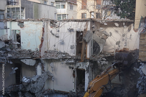 excavator work in demolished building, demolition, debris