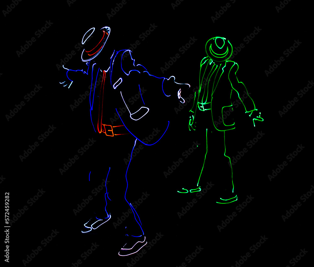 Dancers in suits with LED lamps. light show