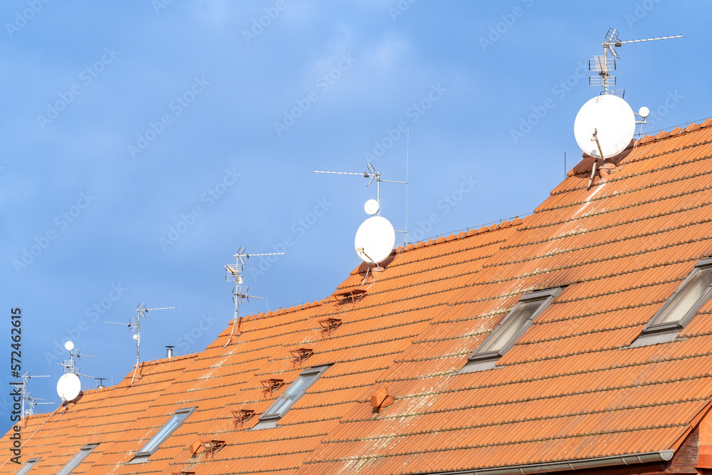 red roofs of family houses with antennas red roofs of family houses with antennas