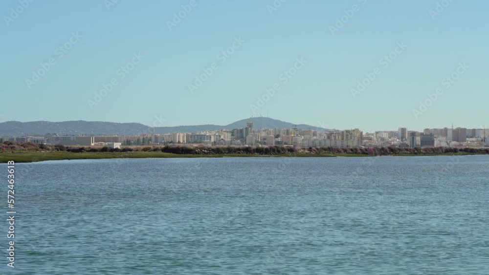 Beautiful sea view of the Ria Formosa park of Faro. journey by ship with a view of city Beautiful sea view of the Ria Formosa park of Faro. journey by ship with a view of city