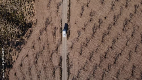 Wide Overhead Drone Flight Tracking RV Driving Road in the Desert, Andalusia, Spain. High quality 4k footage