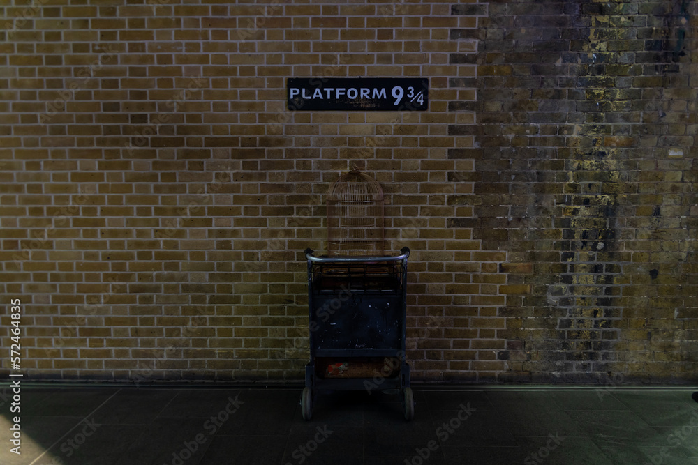 Naklejka premium London UK 01.02.2023: The Famous Harry Potter Platform 9 3/4 in London, a Magical Portal to Hogwarts