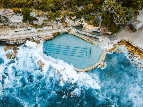 Aerial drone photography shot of the beautiful bronte ocean pool located in sydney, Australia photo