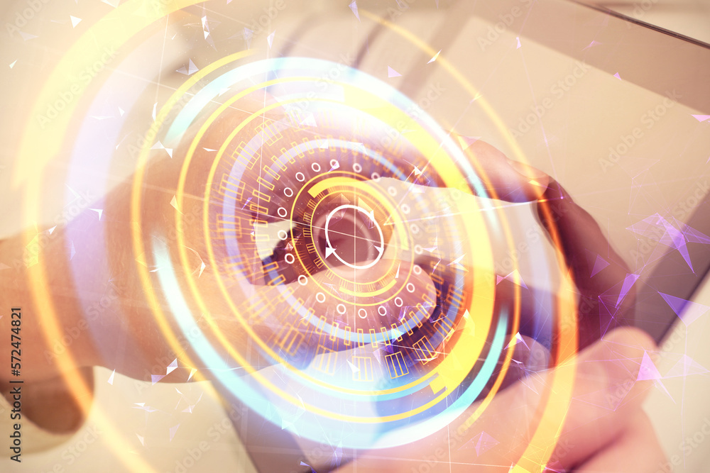 Double exposure of man's hands holding and using a digital device and tech theme hologram drawing. Technology concept. Double exposure of man's hands holding and using a digital device and tech theme hologram drawing. Technology concept.