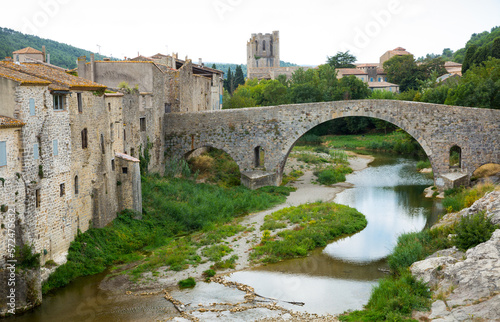 Medieval vaulted arch bridge over Orbieu river in Lagrasse  France..