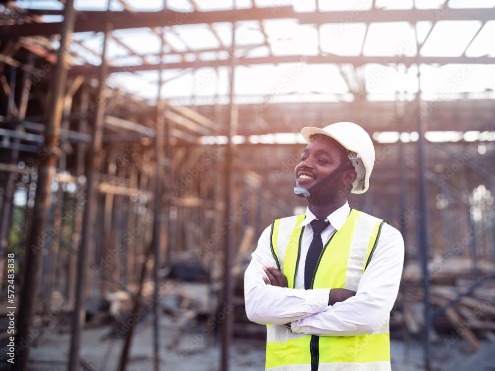 African architects engineer man with hardhat work together in the inside the construction building site.Engineering concepts . African architects engineer man with hardhat work together in the inside the construction building site.Engineering concepts .